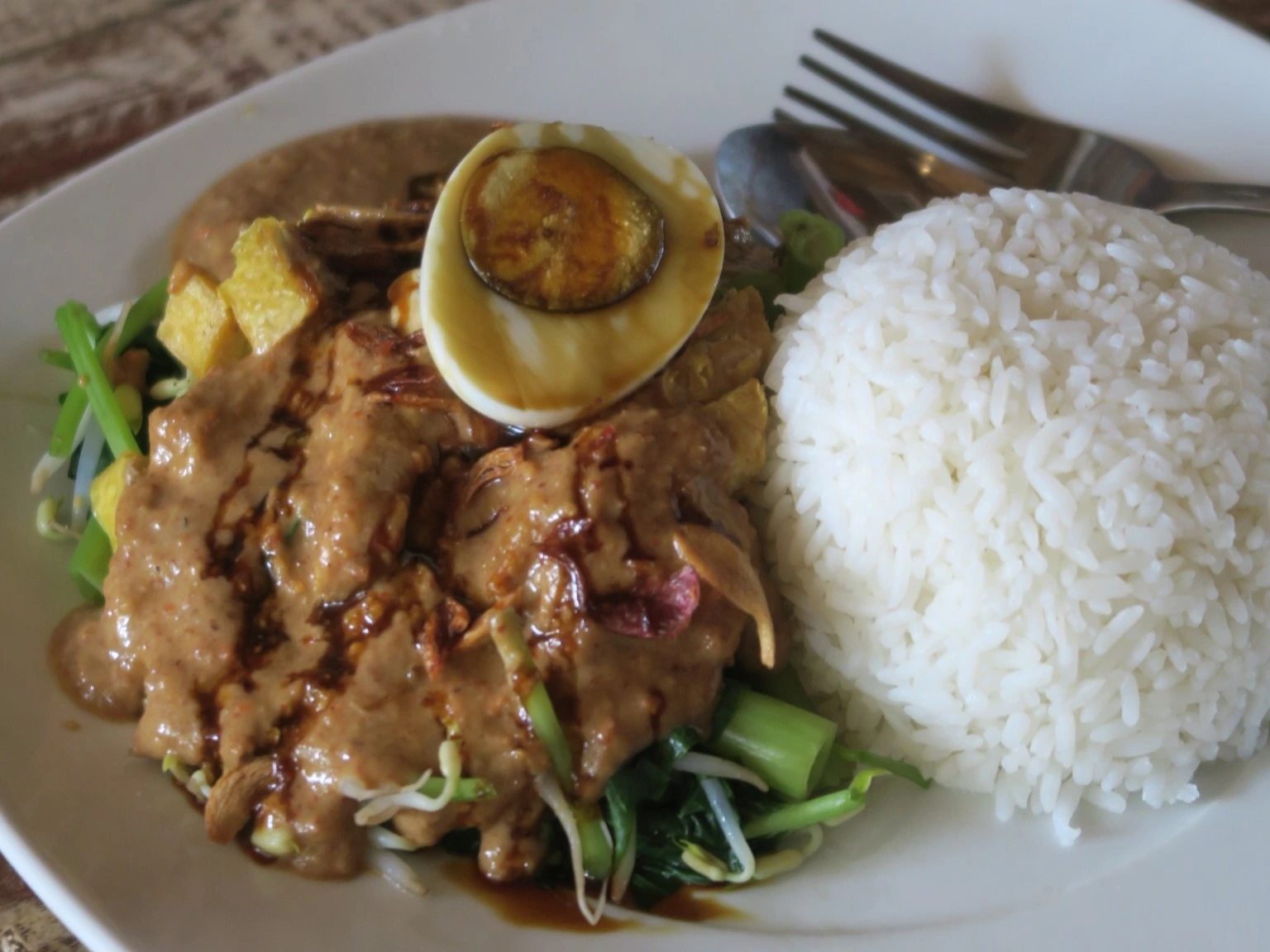 Dining area with a variety of food and elegant decor